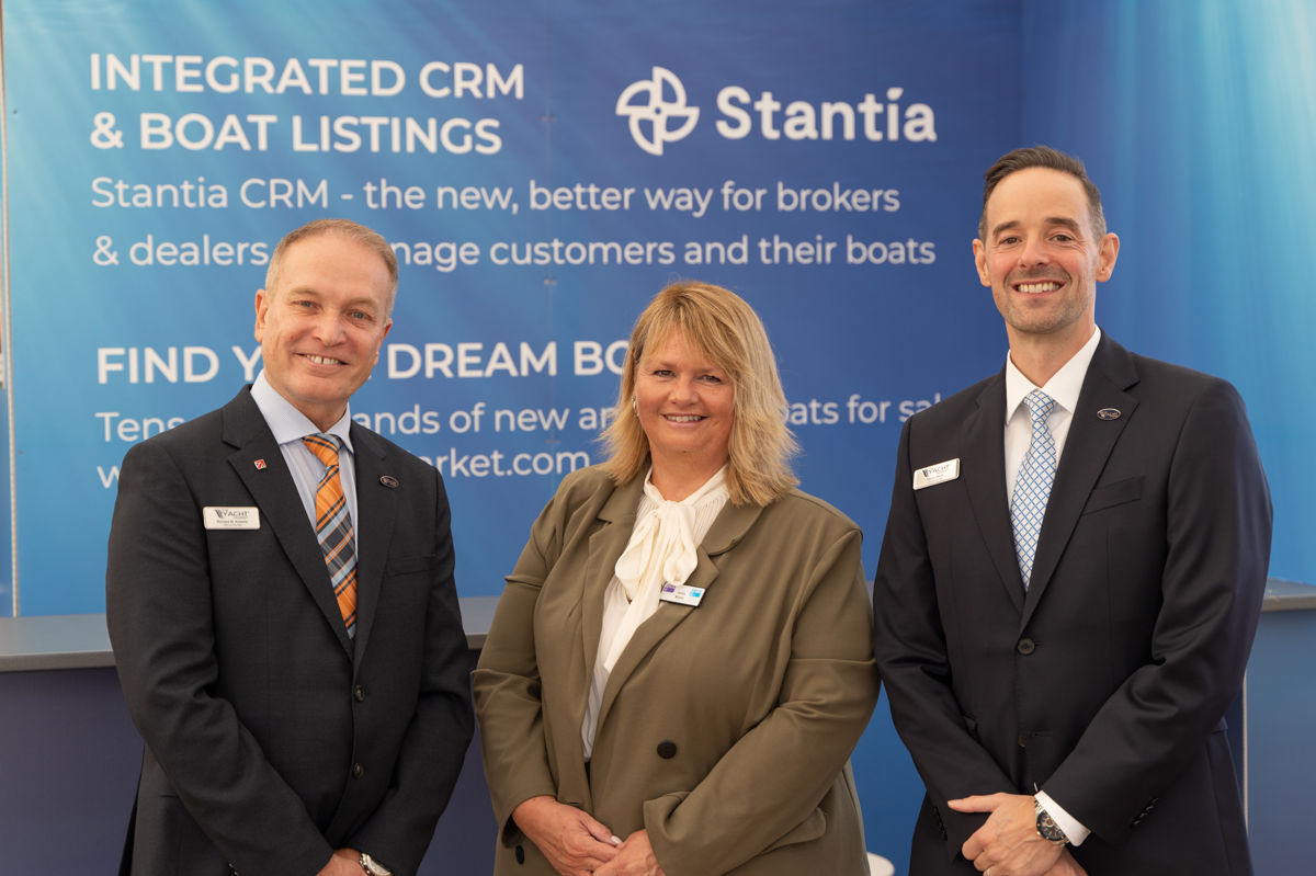 Richard W. Roberts, Karen Wilson (CEO of YBDSA), and Simon White at an event endorsing Stantia CRM by TheYachtMarket.